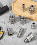 Front view of stainless steel 1/4 in NPT pressure washer quick-connect adapters and fittings