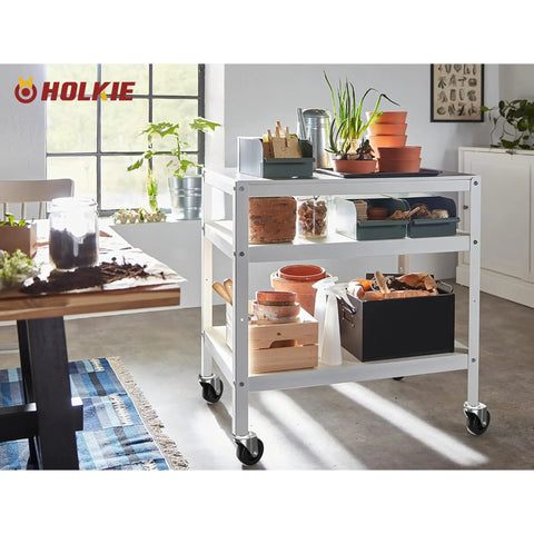 Kitchen table holding gardening supplies with 3 Inch No Brake Swivel Caster Wheels Four Pack for mobility.