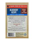 Back packaging of Blueberry Pumpkin Crunchers Grain Free Dog Treats with details and ingredients list visible.