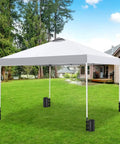 Heavy Duty Canopy Water Weights Bags 88 Lb Tent Anchors 10L Water Bags Windproof Stabilizers For Outdoor Pop Up Tents Gazebos Shelter 4 Pack Black Storm Ready securing a white tent in a garden setting