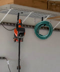 Heavy Duty Ceiling Mount Bike Hooks and Overhead Garage Storage Rack Add On Set With Eight Flat Hooks and Wall Hanger For Ceiling Hanging Bicycles Ladders Tools And Gear installed with hose and trimmer hanging