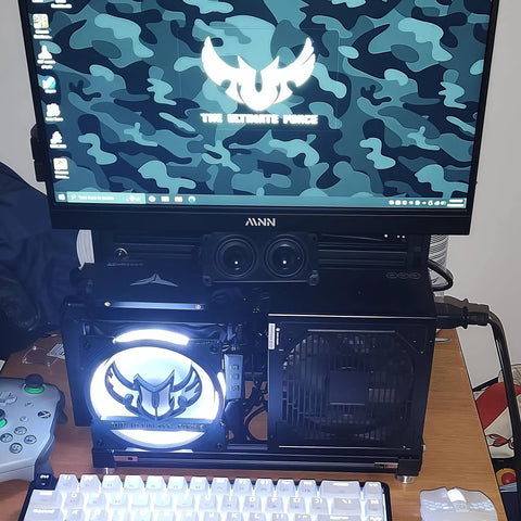 Open Frame PC Test Bench Rig With Aluminum Chassis for DIY Builds Fits ITX MATX ATX Motherboards Holds 2 HDD and 2 SSD Vertical Liquid Cooling Ready Perfect For Overclocking And Custom Rig Building showcasing installed components and illuminated fan.