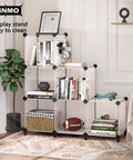 Sixteen Cube Storage Organizer Bookcase Display Shelf With Wooden Mallet Space Saver White Cabinet with books and decor