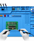Premium Grade All Purpose Silicone Soldering Mat Delivers Heavy Duty Heat Blocking Up To 932 Degrees Fahrenheit For Zero Drama Phone Pc Circuit Board Repair Setup with tools and circuit board.