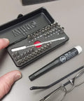 All In One ESD Safe Go Box Micro Bits Set With 39 Pieces Including Slotted Phillips Hex Torx Pentalobe Bits Micro Bit Handle And 100mm Extension shown in black case with user handling