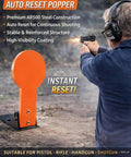 Person shooting at AR500 Steel Shooting Target 12 Inch Auto Reset Popper For Outdoor Range Training, orange target visible