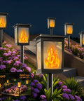 Gen2 Flickering Flame Solar Torch Lights 6 Pack Outdoor Waterproof Garden Decor Lamps Solar Powered Tiki Torches For Patio Pathway Yard Lighting Weatherproof Night Safe illuminating a pathway at night
