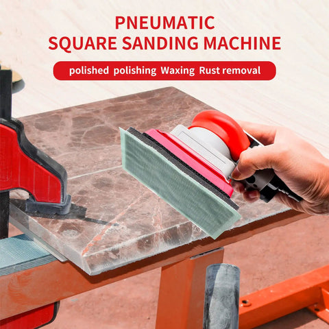 Pneumatic Palm Sander Kit With Random Orbital Action For Auto Body, featuring ergonomic handle on marble surface.