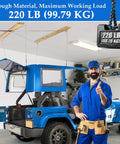 Heavy Duty Jeep Wrangler Hard Top Removal Lift Hoist With Self Levelling Design And Safety Anti-Drop Feature For Easy Roof Access And Secure Lifting Up To Two Hundred Pounds in a garage with a blue Jeep.