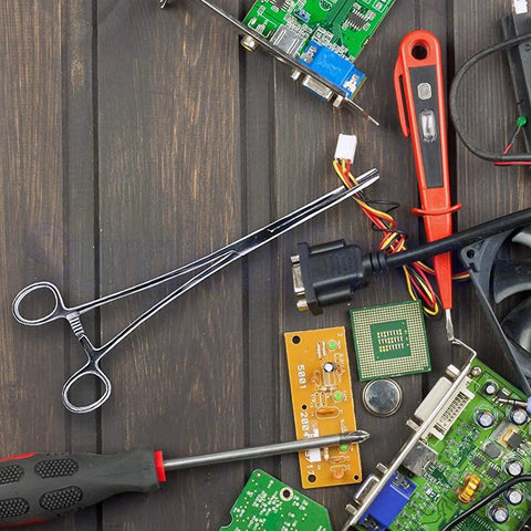 Ultimate 6 Piece Hemostat Set Versatile Locking Clamp Pliers within electronics components on a workbench.