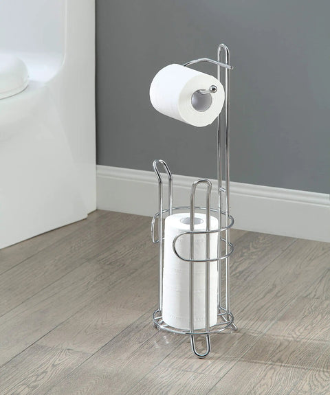 Freestanding Toilet Paper Holder With Storage Holds Three Spare Rolls Heavy Duty Steel Chrome Finish beside bathroom fixture.