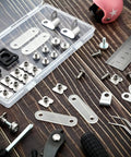 Complete 26 Pcs Football Helmet Repair Kit with chin strap, screws, nuts, and visor clips on a wooden table