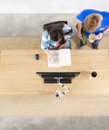 Top view of desktop with Heavy Hitter Single Monitor Desk Mount With Smooth Tilt And Swivel For Screens Up To 32 Inch Or 38 Inch Ultrawide Displays.