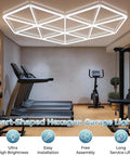 Hexagon Garage LED Light Panels Pack Of 27, 6500K Daylight, 18,720 Lumens, installed in a gym room showcasing shadow-free illumination