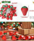 Warm Strawberry String Lights 10 Foot With 20 LEDs Battery Powered Indoor Outdoor Decor coiled next to Christmas gifts