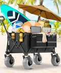 All Terrain Beach Wagon With 9 Inch Inflatable Tires, Heavy Duty Foldable Cart loaded with beach gear on a sandy beach.