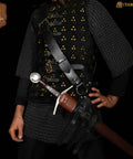 Person wearing Genuine Leather Sword Baldric Belt For LARP And Renaissance Costumes with sword in scabbard, black gear