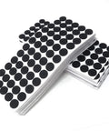 1200 Pack Black Round Self Adhesive Felt Pads For Furniture And Chair Glides Heavy Duty Floor Savers featuring multiple sheets of black felt pads.