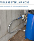 Top Shelf Heavy Duty 1/4 In X 40 In Stainless Steel Air Compressor Jumper Hose connecting to compressor and wall.