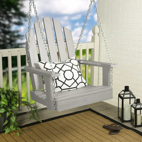 Westport Adirondack Single Seat Porch Swing Harbor Gray for One Person with pillow on porch