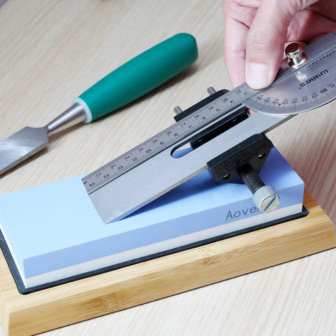Honing Guide For Chisels And Planes With Precise Angle Control And Sharp Edge Every Time A Durable Sharpening Jig resting on a whetstone