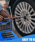 Person using Thick Wall 10 Spline Lug Nut Key Set next to car wheel, socket tool set visible in blue case, heavy-duty alloy build.