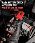 Gloved hand holding Round Jaw Digital Clamp Meter With NCV And 2000 Counts for checking car battery.