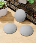 Gray Silicone Door Handle Buffer Guards 4 Pack Self Adhesive Wall Protectors shown on a wooden surface
