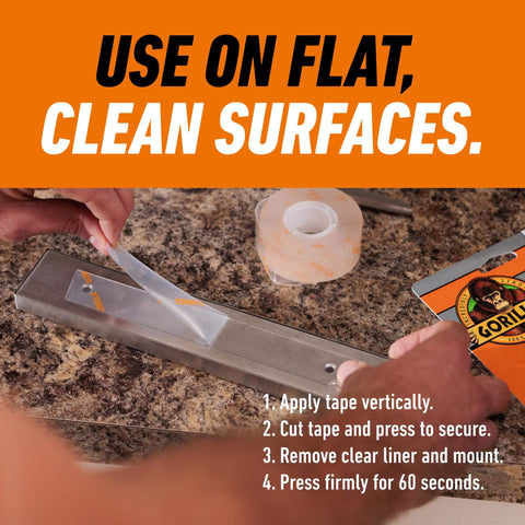 Crystal Clear Double Sided Mounting Tape Weatherproof 1 Inch By 60 Inch Holds Up To 15 Lbs being applied on flat surface
