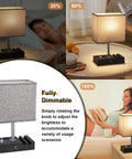 Fully Dimmable Nightstand Lamp With USB C Ports And Phone Stand, grey lamp on a wooden table, brightness levels shown