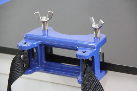 Bench Mount Cylinder Bracket For Gas Cylinders And Canisters showing heavy duty clamp on table with secure straps
