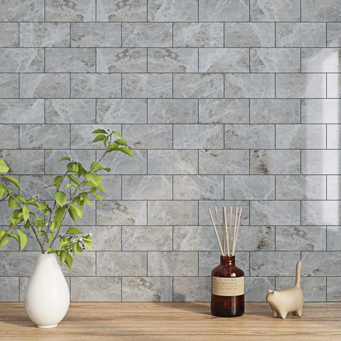 Tile Peel and Stick Backsplash 3x6 Grey Marble Subway Self-Adhesive Waterproof for Bathroom and Kitchen Wall Tiles No Grout Removable Easy Install RV Fireplace in a styled room with decor.