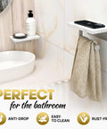 Total Game Changer, Two Shelf Wall Mounted Toilet Paper Holder With Natural Marble Top And Sleek Nickel Finish, No Sweat Screw Setup Bathroom Tissue Holder displayed in a modern bathroom.