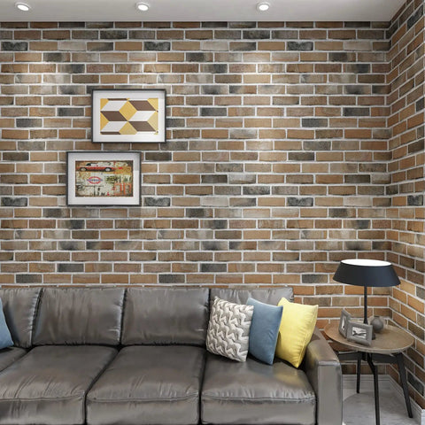 Living room with Peel And Stick Faux Brick 3D Wall Panels 10 Pack 52.5 Sq Ft In Gray Brown accent, sofa, and framed art.