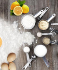 11 Piece Stainless Steel Measuring Spoons And Cups Set With Engraved Metric And Imperial Markings And Stackable Design For Everyday Cooking Baking Dry And Liquid Ingredients Great Gift stainless steel measuring cups and spoons with flour, milk, and eggs