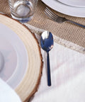 Rustic table setting with a plate on a wood slice from Ten 13-14 Inch Wood Slices For Go-To Centerpieces Set Of 10