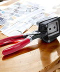 Go-To 50X50Mm Square Photo Cutter Handheld Die Punch Tool on table with red handles