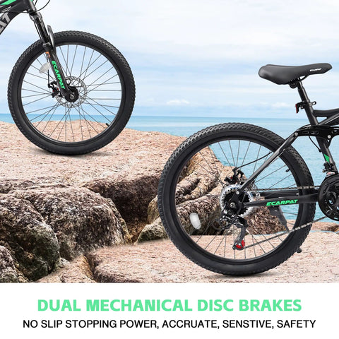 Beefed Up Dual Suspension 24 Inch Mountain Bike With 21 Speed Disc Brakes Front Fork And Rear Shock Absorber Carbon Steel Frame on rocks