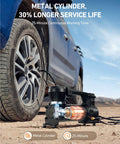 Heavy Duty 12V Air Compressor Portable Tire Pump dropping a solid 120 Psi blast next to a truck tire on dirt.
