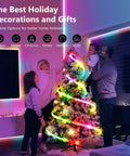 Family decorating Christmas tree with RGBIC LED Strip Lights 16.4ft Smart Color Strip With HomeKit Alexa Google WiFi Control.