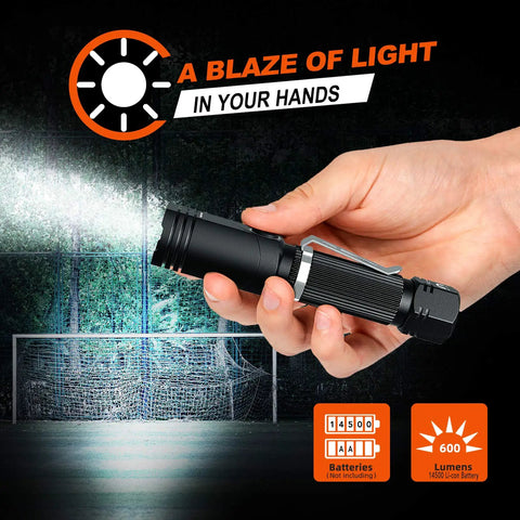 Hand holding Beast 600 Lumen Tactical Flashlight With 90 Degree Angled Head IP65 Waterproof LED Mini Light in front of goal net