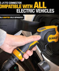 Hand plugging Go To Portable Level 1 And Level 2 EV Charger, 16 Amp, 120 To 240 Volt, 25 Foot Cable into vehicle charging port.