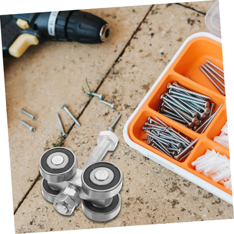 Top Shelf Stainless Steel Sliding Door Wheels Replacement Kit Featuring Dual Bearing Pulleys on work surface with screws.