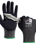 Tough As Nails A6 Cut Resistant Work Gloves with knife, showcasing grip and flexibility for metal fabrication jobs.