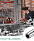 Worker using 304 stainless steel seamless tubes in workshop for industrial applications