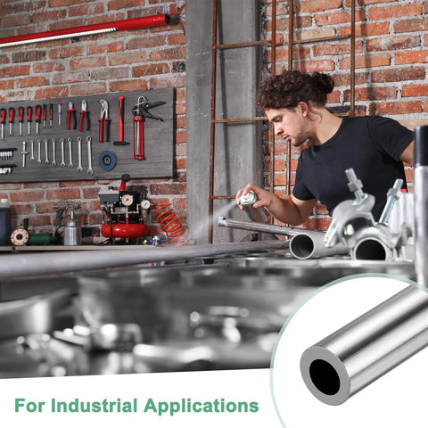 Worker using 304 stainless steel seamless tubes in workshop for industrial applications
