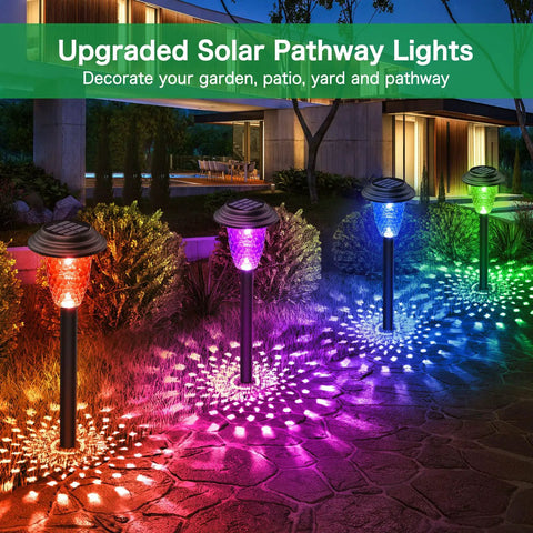 8 Pack Solar Pathway Lights With Auto 7 Color Changing And Warm White Modes illuminating a garden walkway at night