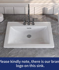 Slick White Ceramic Drop In Bathroom Sink 21 By 18 Inch Rectangle Basin with three hole faucet setup, mounted on countertop.
