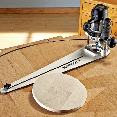 Circle Cutter Router Jig For Pro Grade Circle Cutting From 10 Inch To 52 Inch Diameter Includes Pivot Pins And Mounting Hardware Fits Most Popular Routers in use on a wooden table.
