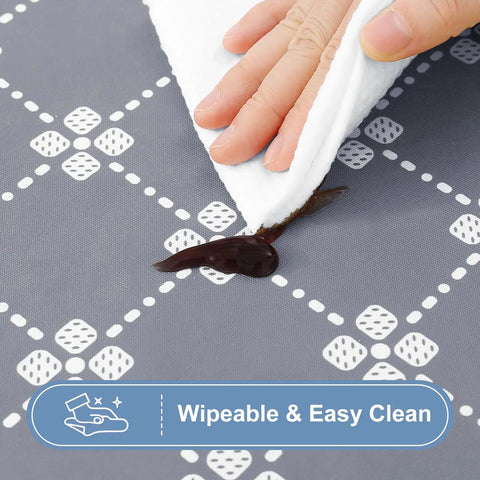 Close-up wiping spill on Rectangular Vinyl Table Cloth With Elastic Fitted Edges And Flannel Backing, Waterproof, Stain Resistant, Gray